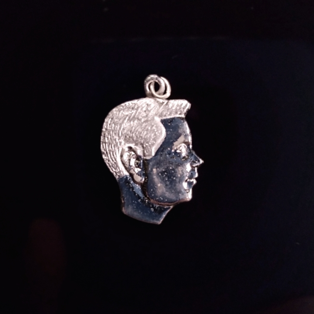Vintage 1940-50's boy Sterling silver charm.